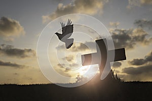 Silhouette Jesus christÃÂ deathÃÂ on cross crucifixion on calvary hill in sunset good friday risen in easter day concept for